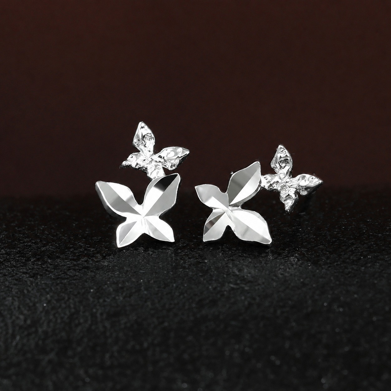 Elegant and Stylish Earrings Featuring a Multi Faceted Butterfly Silhouette in Minimalist 925 Sterling Silver Stud Earrings view 2