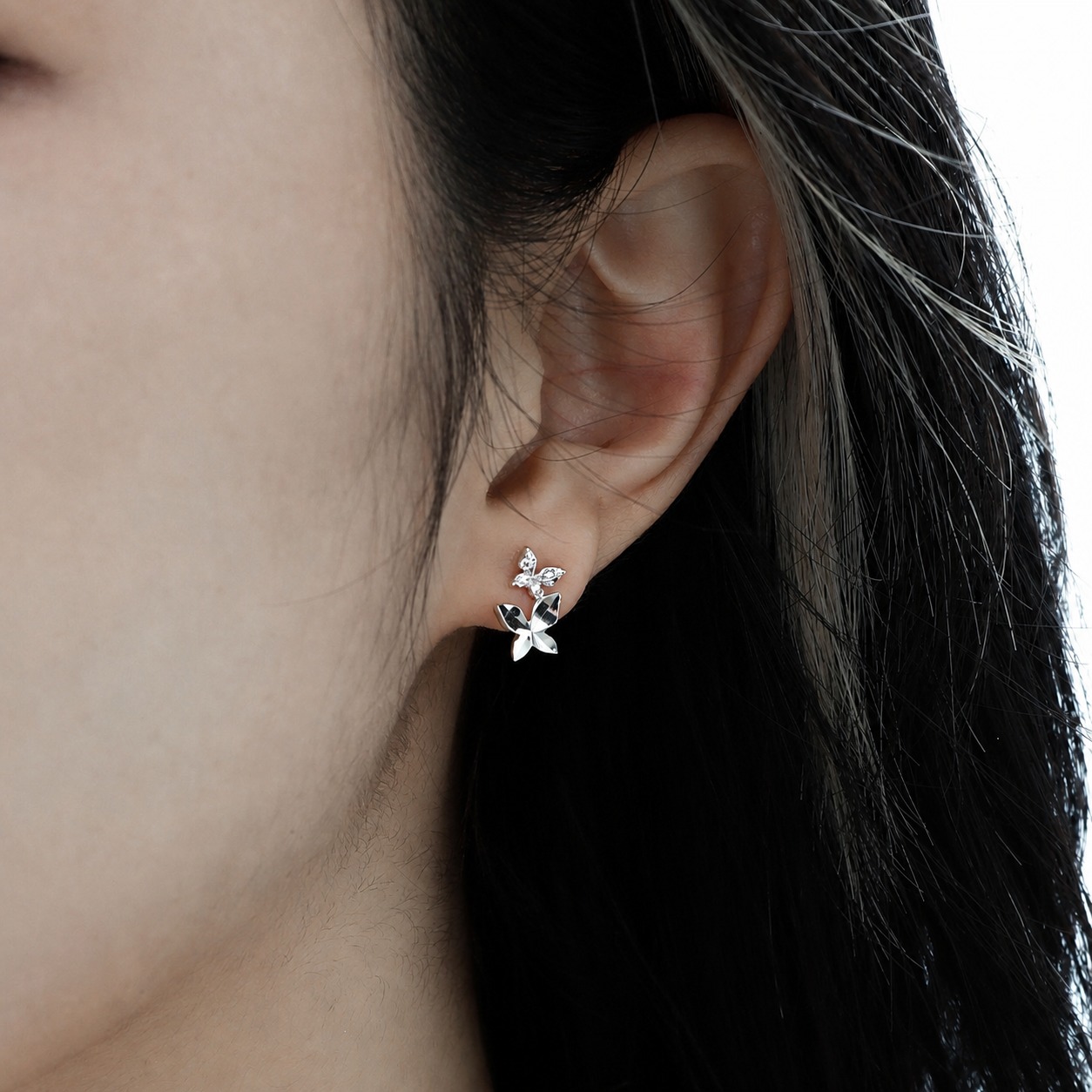 Elegant and Stylish Earrings Featuring a Multi Faceted Butterfly Silhouette in Minimalist 925 Sterling Silver Stud Earrings view 3