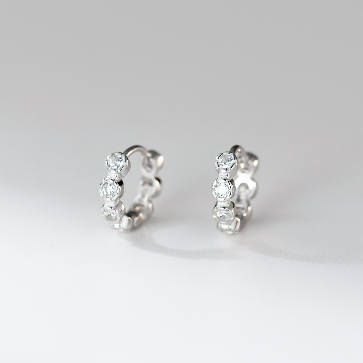 Amazing Crystals Round Bezel Set Huggie Hoop Earrings In 925 Sterling Silver With Silver Or Yellow Gold Finish Minimalist Shining Elegant Fashion Earrings view 4