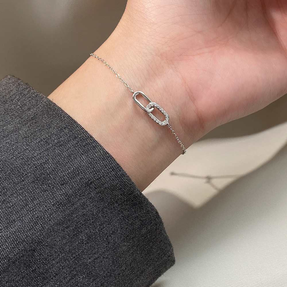 Amazing Crystals Oval Link Chain Bracelet In 925 Sterling Silver With Silver Or Gold Tone Finish Minimalist Interlocking Paperclip Style Adjustable Daily Wear Fashion Jewelry For Women view 2