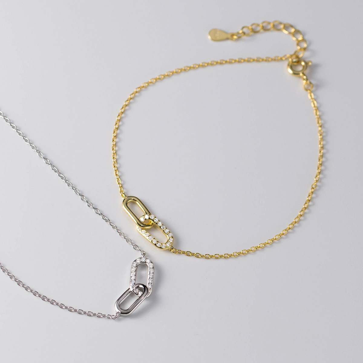 Amazing Crystals Oval Link Chain Bracelet In 925 Sterling Silver With Silver Or Gold Tone Finish Minimalist Interlocking Paperclip Style Adjustable Daily Wear Fashion Jewelry For Women view 4